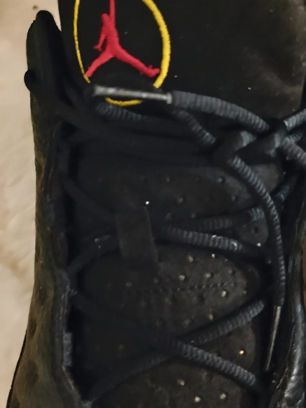 Jordan Black Sneakers with Red Jumpman and Yellow Trim